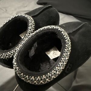 UGG Black Slippers with Metallic Trim some of the sticking came off